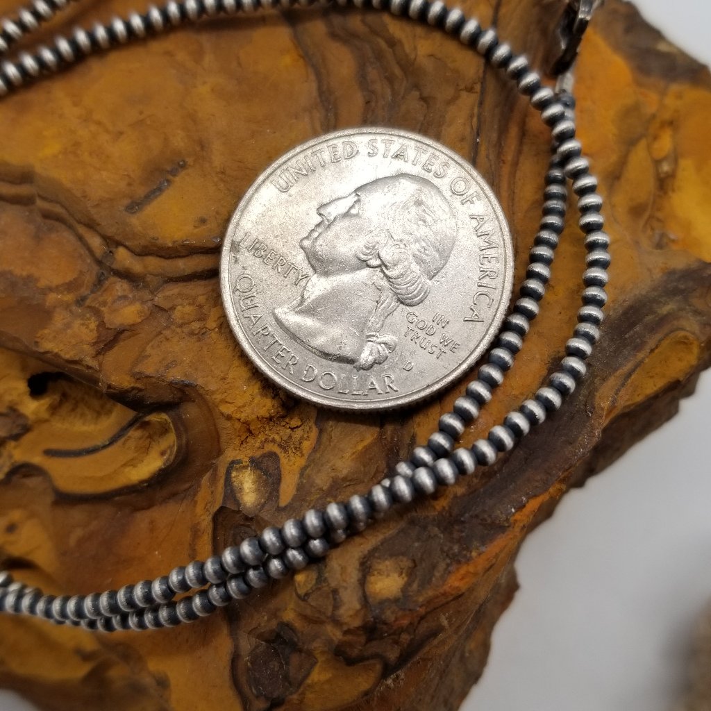 Navajo Pearl Serenade: 2mm Delicate Strand of Elegance