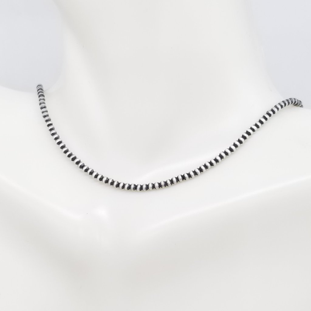 Navajo Pearl Serenade: 2mm Delicate Strand of Elegance