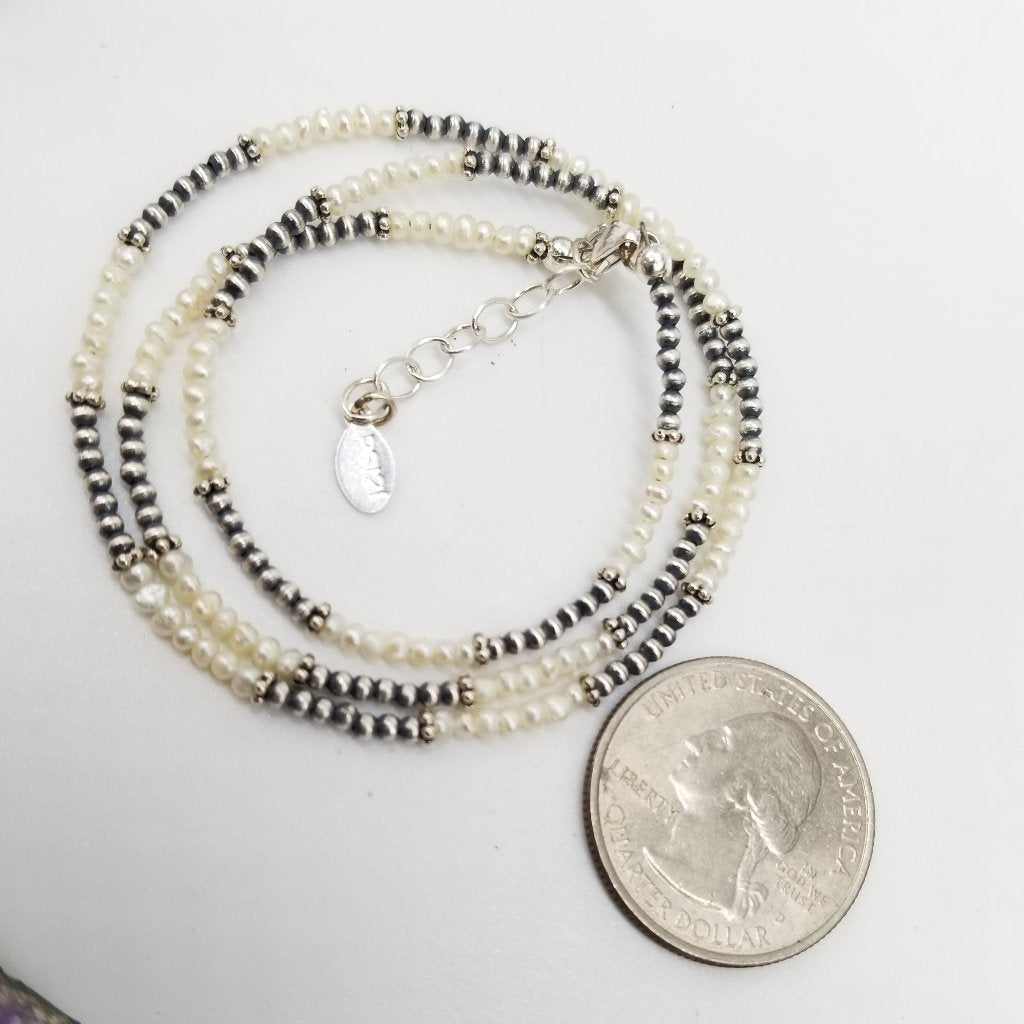 Navajo Harmony: Sterling Silver Necklace with Freshwater Pearls