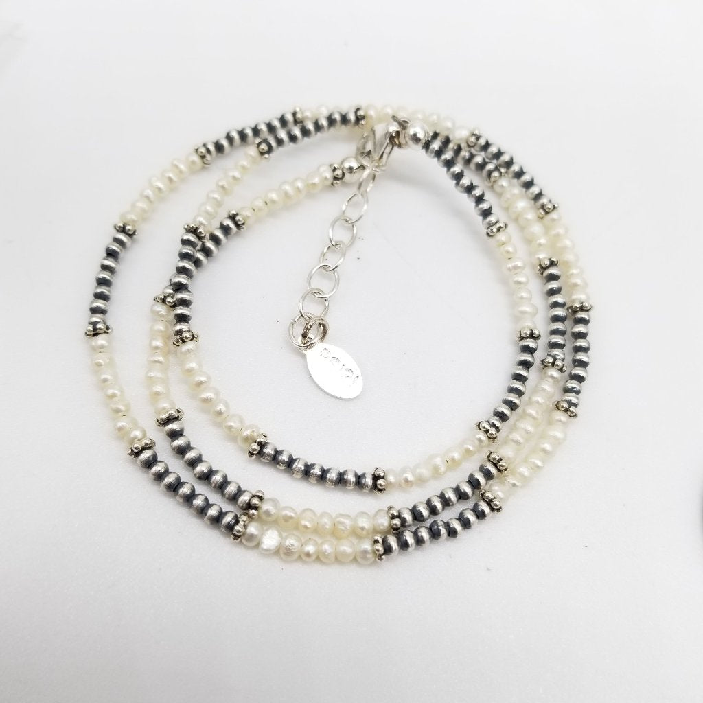 Navajo Harmony: Sterling Silver Necklace with Freshwater Pearls