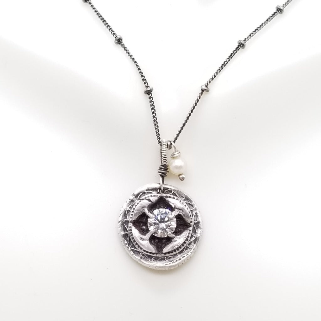 Sterling silver Signature charm with 6mm white topaz and pearl drop on a oxidized 18in sterling silver chain