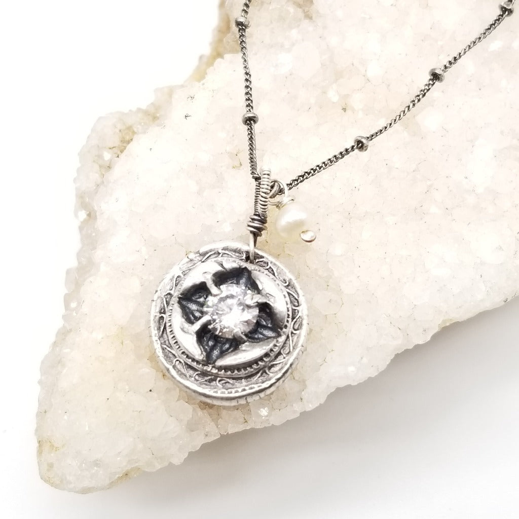 Sterling silver Signature charm with 6mm white topaz and pearl drop on a oxidized 18in sterling silver chain