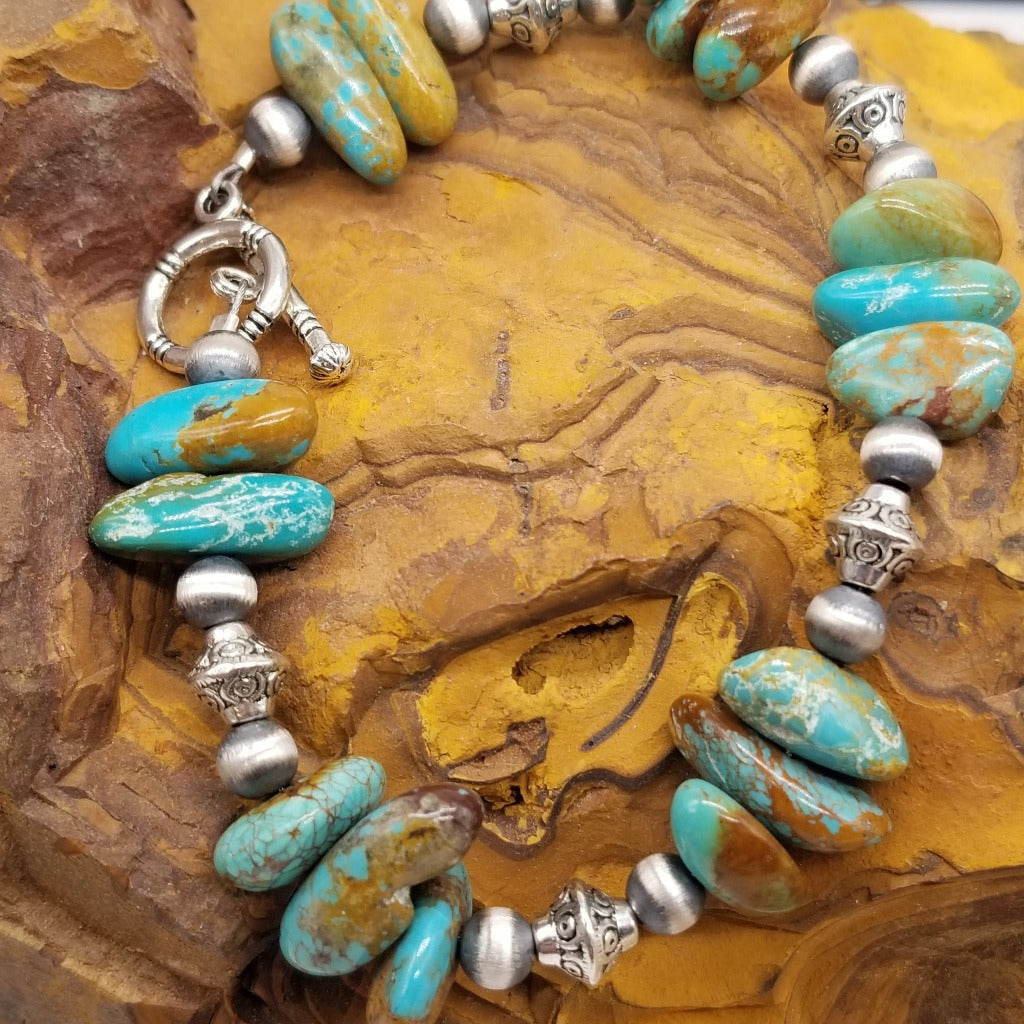 Elevate Your Style with the Captivating Boulder Turquoise Chip Bracelet - A Harmonious Fusion of Spirituality and Handcrafted Elegance