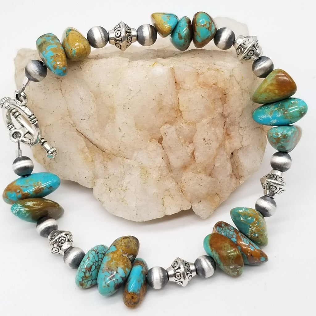 Elevate Your Style with the Captivating Boulder Turquoise Chip Bracelet - A Harmonious Fusion of Spirituality and Handcrafted Elegance