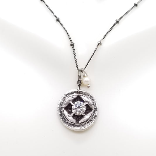 Sterling silver Signature charm with 6mm white topaz and pearl drop on a oxidized 18in sterling silver chain